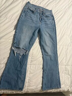 American Eagle Outfitters Light Wash Flare Jeans with Distressed Knee